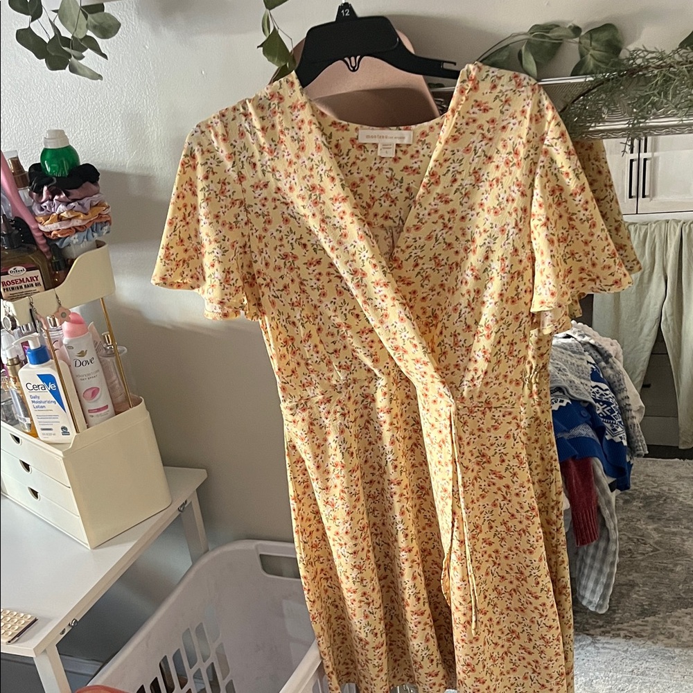 Floral Wrap Mini Dress in Yellow by [Brand]